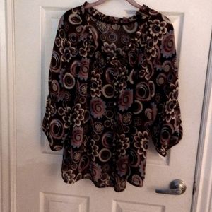 Long sleeve light weight floral blouse.  Button up and gathered sleeves.